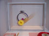 Odessa open bloom with red bud & wheat in hanging black embroidery hoop in blud outline box